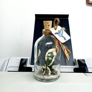 Origami Dollar Eagle in the bottle.